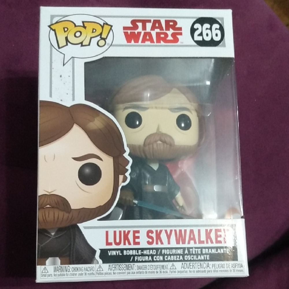 Star Wars Luke Skywalker Vinyl Bobble-Head with Brown Hair and Blue Lightsaber